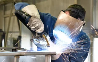 Welder using their first welding machine.