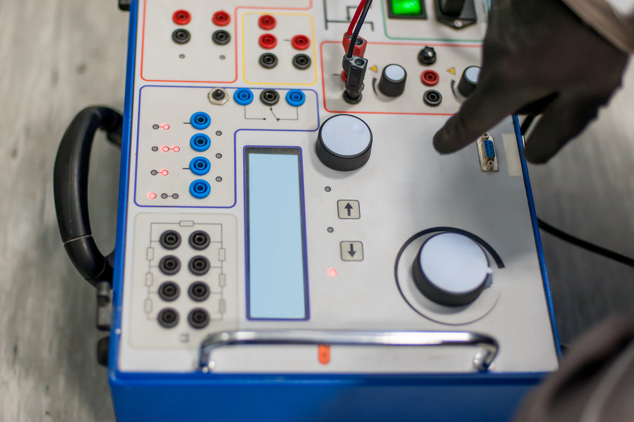 Maintenance engineer inspect system with relay test set equipment Load bank testing services